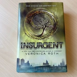 Insurgent book/ 2nd book in divergent series , hard cover with dust cover.